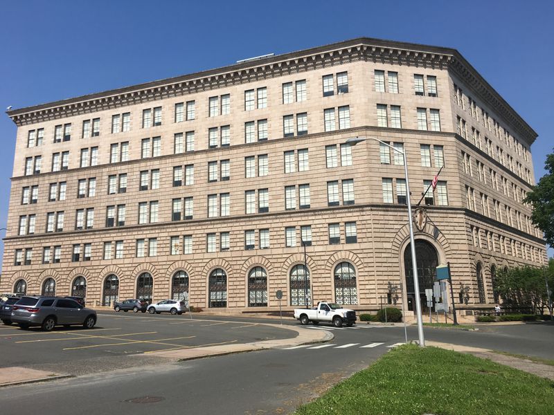 The majority of state office workers are relocating to the State Office Building from leased space at 55 Elm St., shown here, on nearby Pulaski Circle.