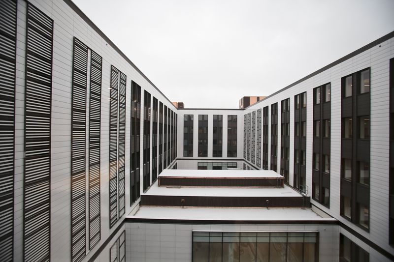 The interior courtyard of the State Office Building after the $205 million renovation has terra cotta panels covering walls that had been stained with rust.